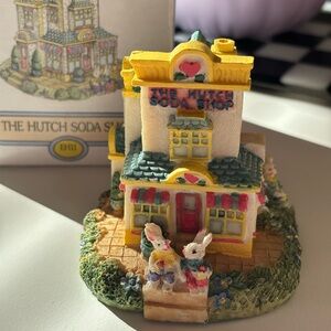 The bunny family village hutch soda shop 1995 figurine comes with box!